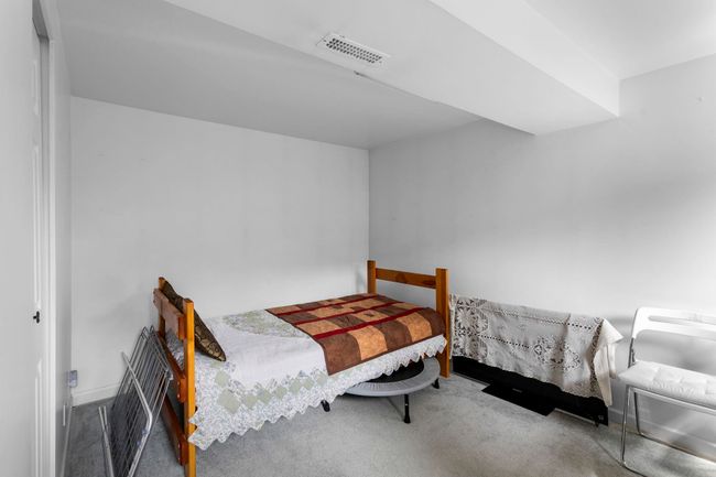 Bedroom with carpet flooring | Image 30