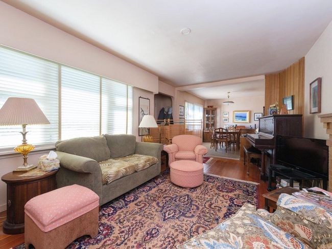 Living room with wood finished floors | Image 4