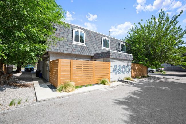 View of front of home with roof and brick siding | Image 4