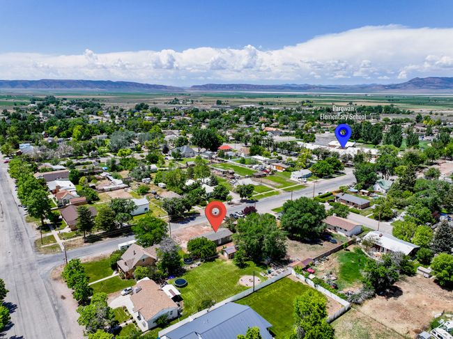 Aerial view of residential area with a mountain backdrop | Image 27