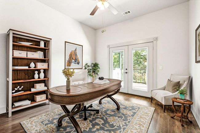 Office space with french doors, ceiling fan, and dark wood-type flooring | Image 31