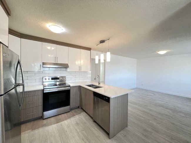 6132 Madigan Drive Ne, Home with 5 bedrooms, 2 bathrooms and 2 parking in Calgary AB | Image 8