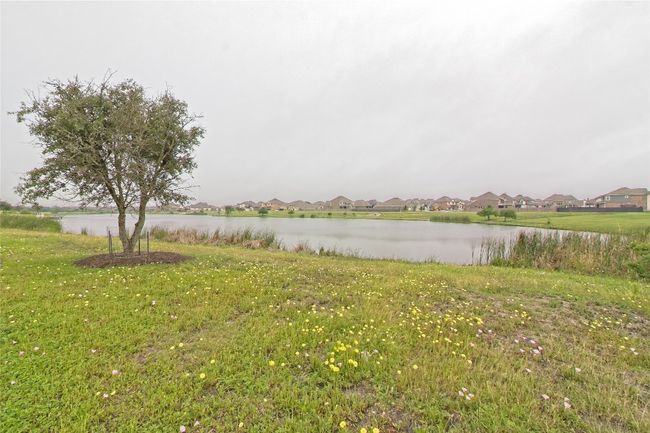 Water view with nearby suburban area | Image 40