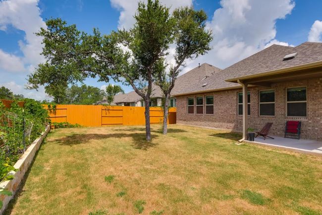 View of yard featuring a patio | Image 32