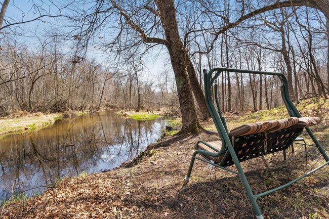 Welcome to tranquility with 650' of shoreline on the Sunrise River. | Image 39