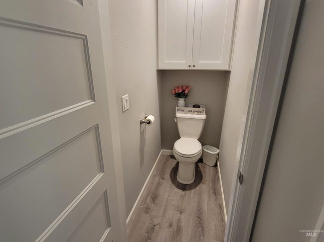 Bathroom featuring wood finished floors and toilet | Image 20