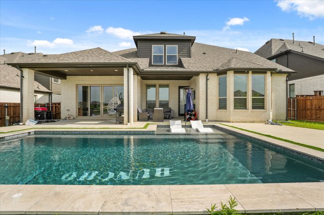 Back of house featuring a patio, brick siding, and roof with shingles | Image 27