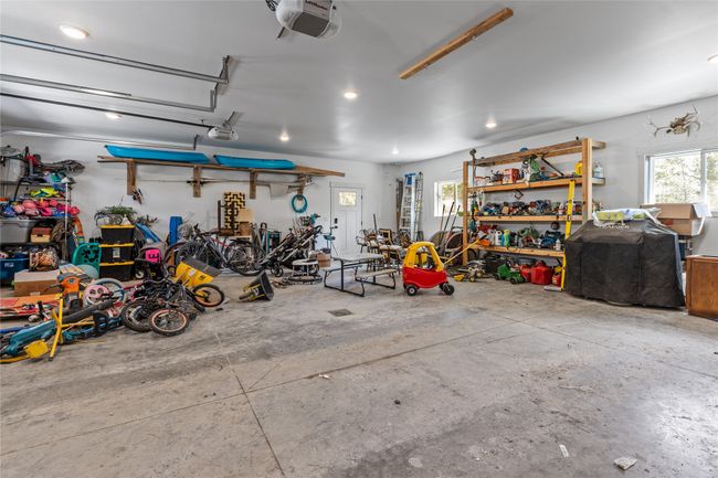 Garage featuring recessed lighting and a garage door opener | Image 43