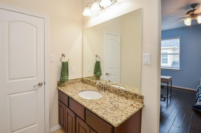 One of the two vanities of the shared bathroom. | Image 26