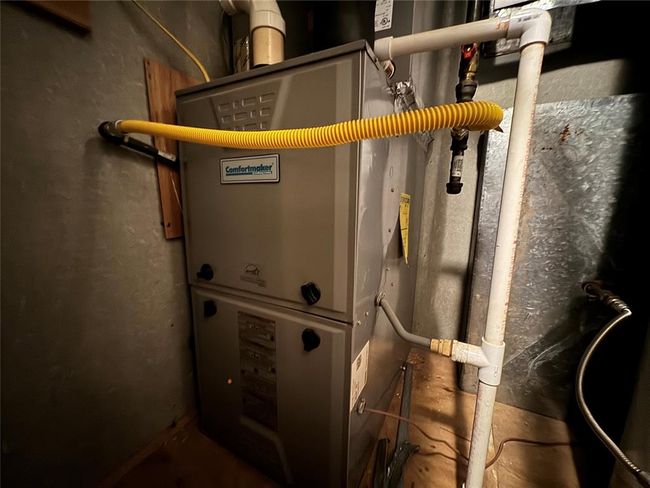 Utility room featuring heating utilities | Image 25