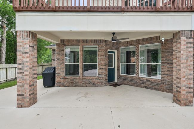 The spacious covered patio. On the left you'll find side decking that leads all the way to the back gate. | Image 40
