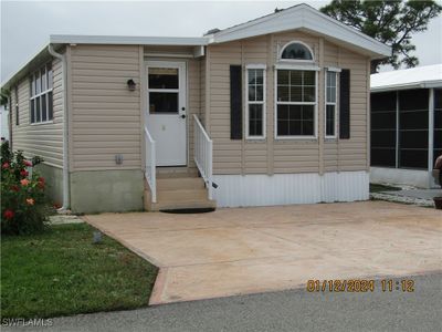 Manufactured / mobile home featuring a patio | Image 1