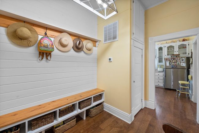 Mudroom featuring wood finished floors and baseboards | Image 17