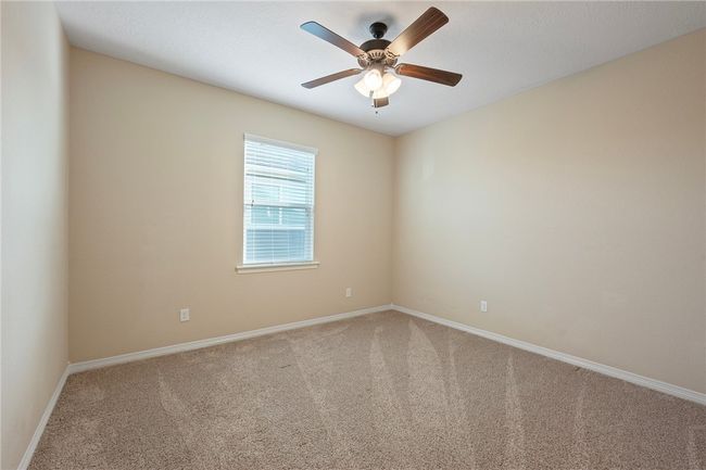 Empty room featuring carpet and ceiling fan | Image 21