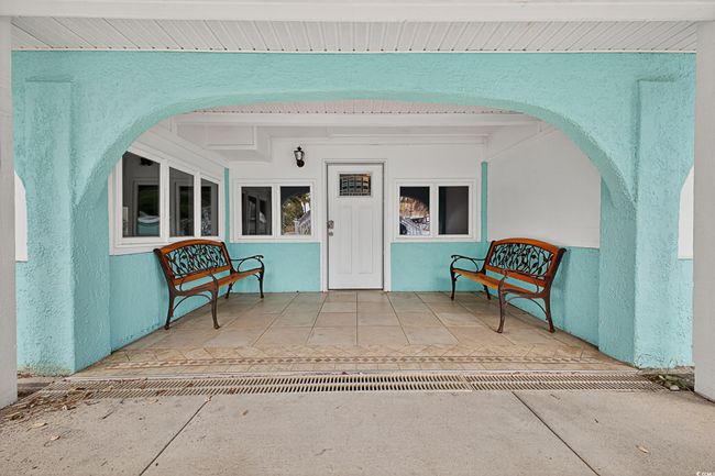 Doorway to property with stucco siding | Image 4