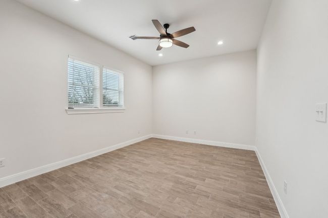Unfurnished room featuring recessed lighting, light wood-style flooring, baseboards, and ceiling fan | Image 9