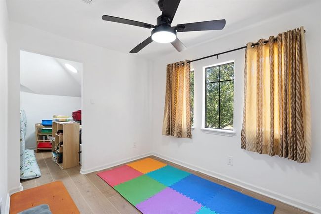 Spacious play area perfect for kids or recreational use, with an additional storage room to keep the space organized and clutter-free. | Image 34