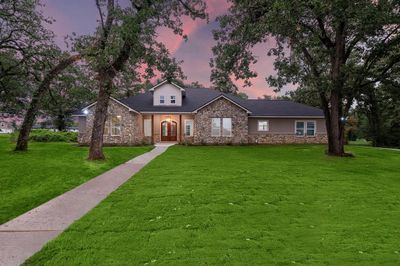 Experience the epitome of luxury in this beautifully designed home, where every detail has been considered. | Image 1