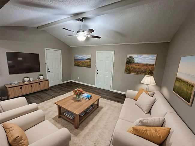 Living room featuring wood finished floors, ceiling fan, and a textured ceiling | Image 4