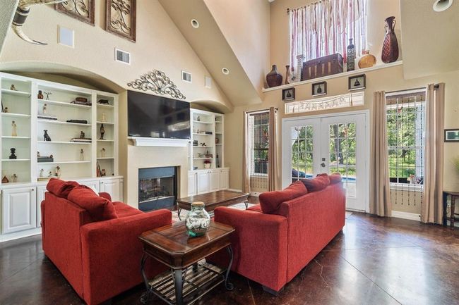 Open living room with lots of natural light. | Image 10