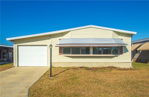 908 Oleander Cir, Barefoot Bay, FL, 32976-7661 | Card Image