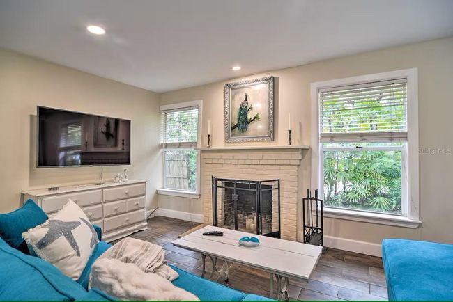 Fireplace in main house living room | Image 4