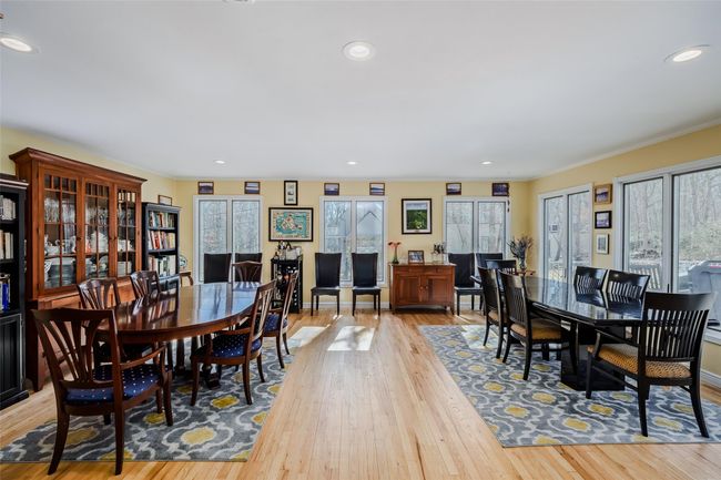Dining area with light wood-style flooring, plenty of natural light, recessed lighting, and baseboards | Image 16