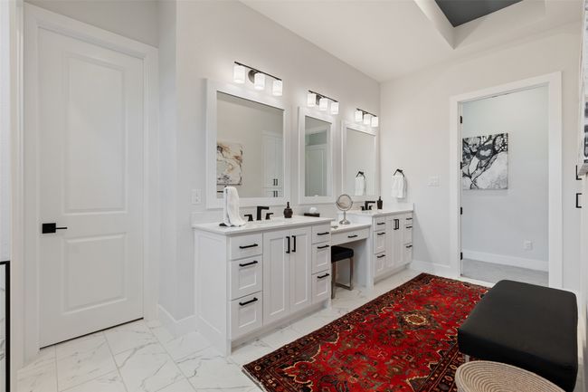 Full bath featuring baseboards, marble finish floor, and vanity | Image 18