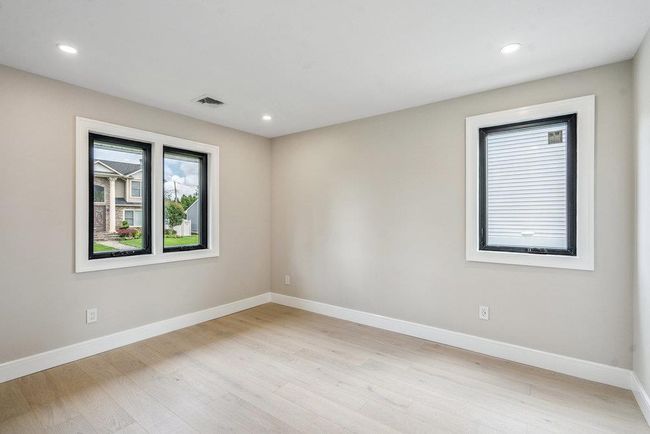 Bedroom with Hardwood-flooring and recessed lighting | Image 20