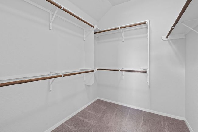 Walk in closet with carpet flooring | Image 29