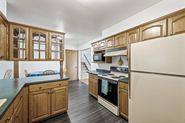 New Luxury Vinyl Flooring In The Kitchen and Dining Area | Image 6