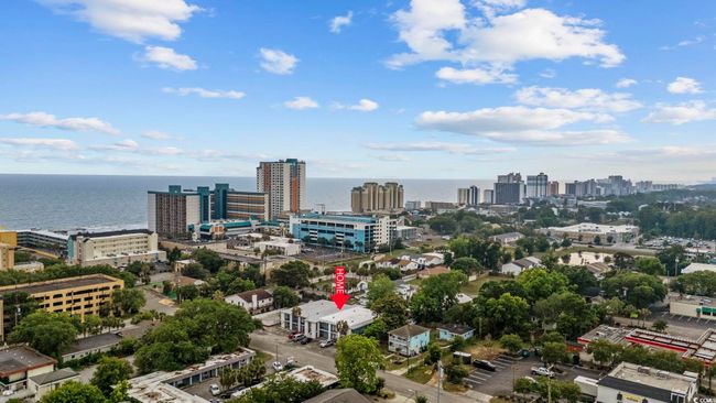 View of urban area with a nearby body of water | Image 17