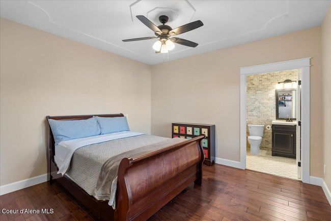 Spacious main level primary bedroom | Image 21