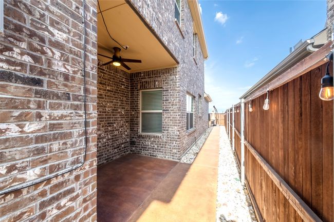 View of patio featuring ceiling fan | Image 33