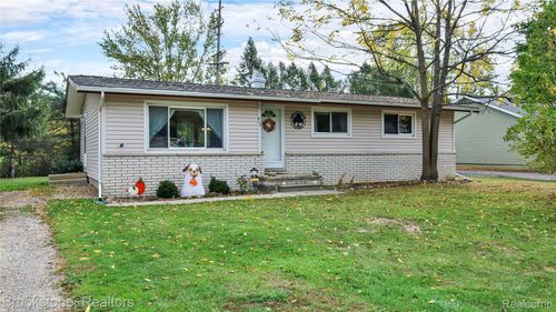 410 N Lester St, Capac, MI, 48014-3140 | Card Image