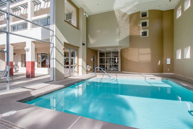 Community pool featuring a patio | Image 26