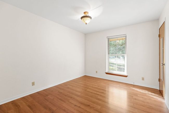 Empty room featuring light wood-style flooring | Image 22