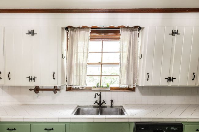 The kitchen overlooks the back yard allowing the outdoors in. | Image 25