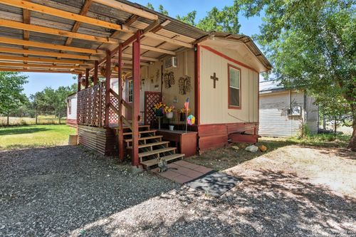 613 Avenue J, Poteet, TX, 78065-5433 | Card Image