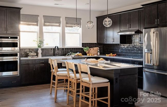 The Wright Model | Context at Oakhurst *actual finishes, color scheme, orientation vary on this home. Furniture not included | Image 7