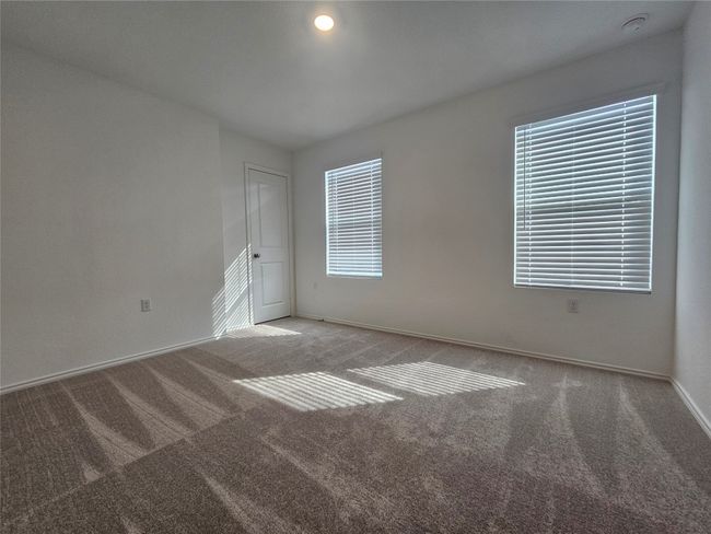 Unfurnished room featuring baseboards and carpet | Image 25