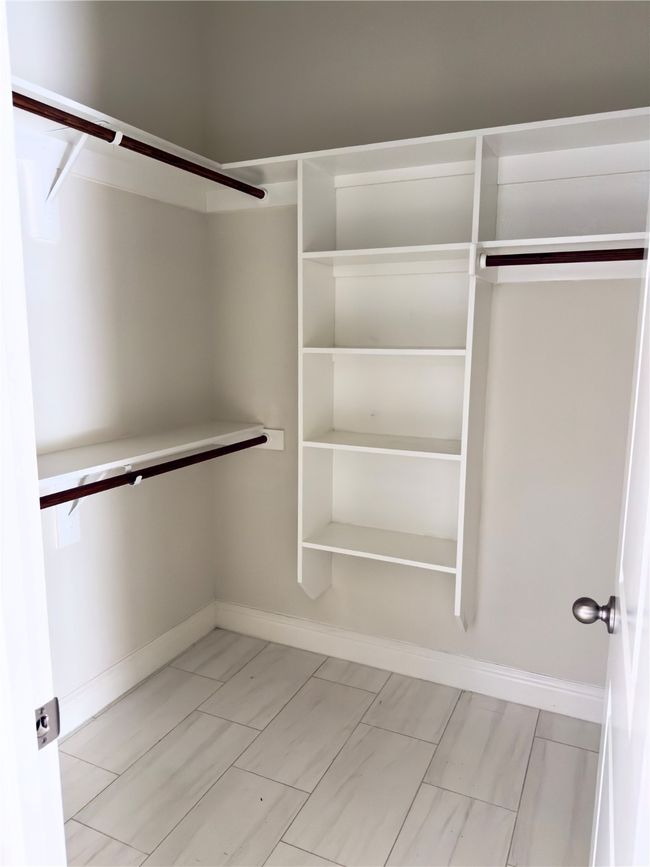 View of walk in closet | Image 28