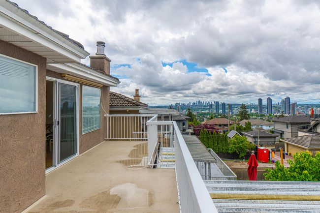 Balcony with a view of skyline | Image 27
