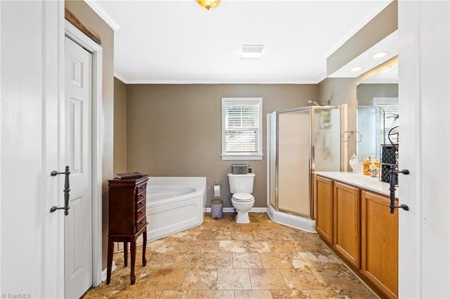 Large ensuite bath with separate tub & shower | Image 22