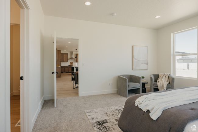 Bedroom featuring light carpet, recessed lighting, and baseboards | Image 15