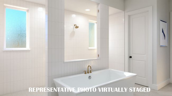 Featuring a walk through double shower, drying space and a free standing tub, this owner's bath is one for the ages! REPRESENTATIVE PHOTO VIRTUALLY STAGED | Image 13