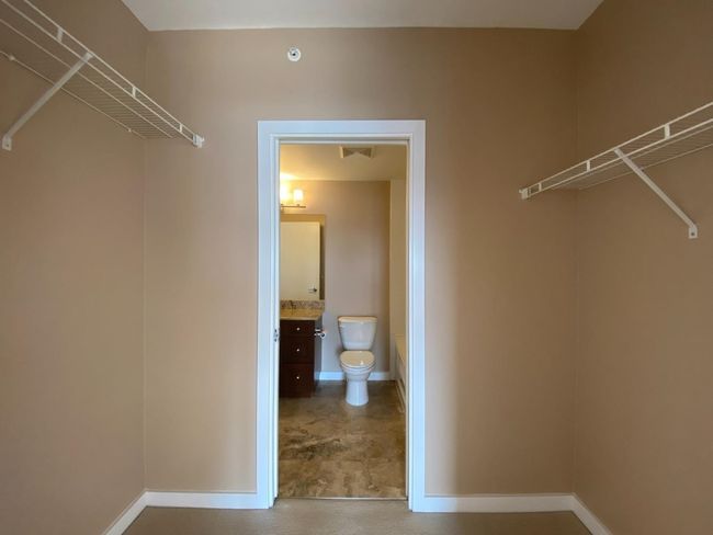 View of walk in closet | Image 5