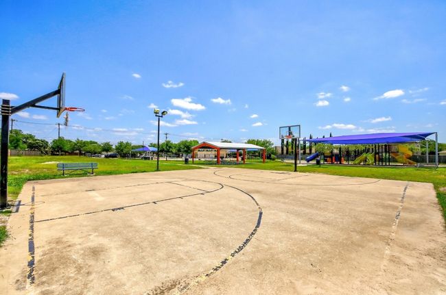 View of basketball court featuring community basketball court, a gazebo, playground community, and a lawn | Image 39