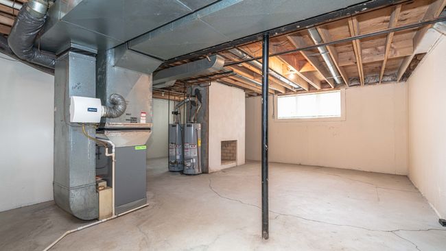 fireplace in lower level with daylight windows | Image 48