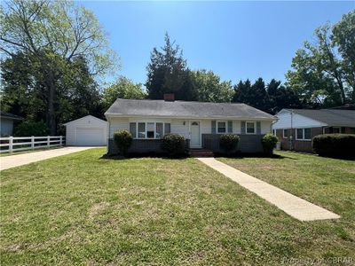 Front of Homestructure, a garage, and a front yard | Image 2